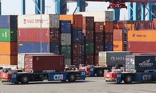 Freight containers arranged at a shipping terminal